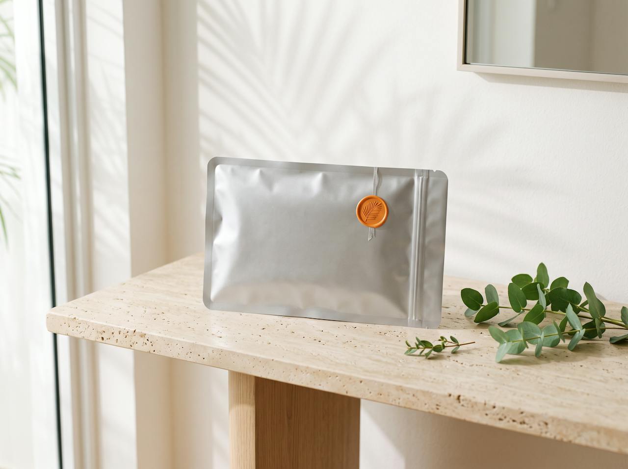 Discreet sealed Orange Grove Rx package resting on a stone shelf